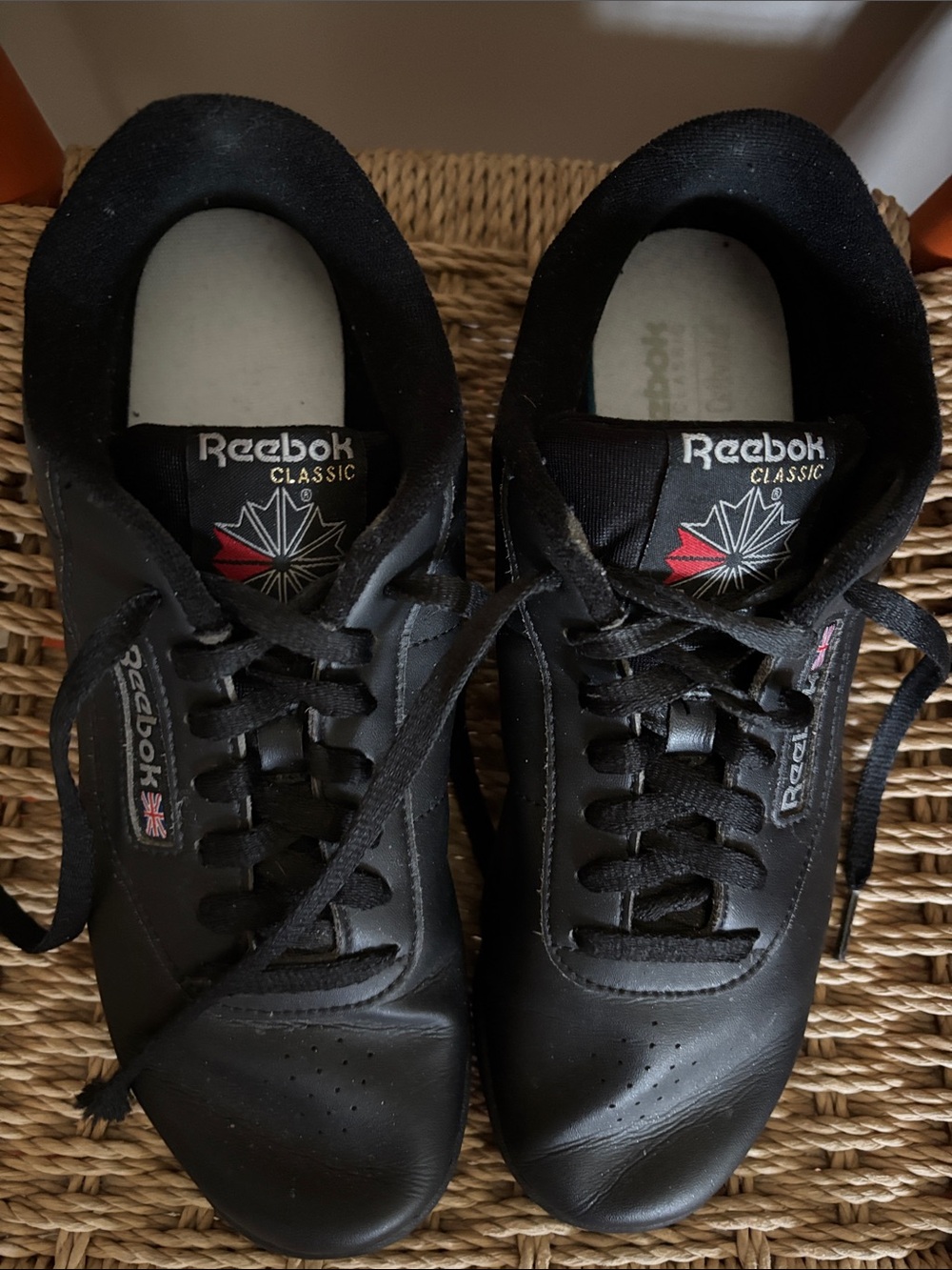 Reebok Classic Women’s Black Leather Sneakers with Red Accent
